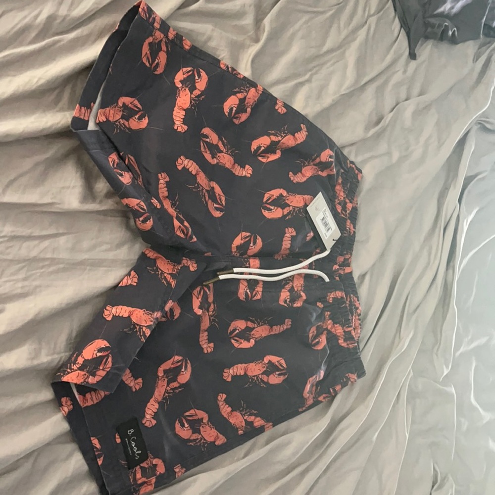 B. Cools men’s swim suit. New with tags